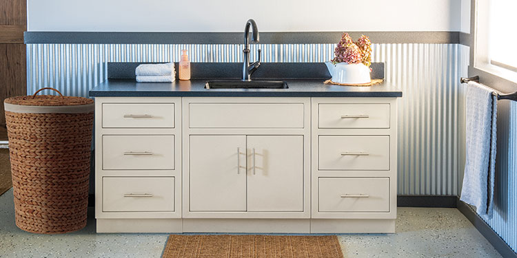 Rock Run Cabinetry Bathroom Sink Cabinet shown in Sandstone
