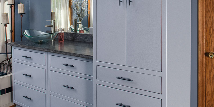 Rock Run Cabinetry Aluminum Bathroom Cabinets shown in Blue Speckle