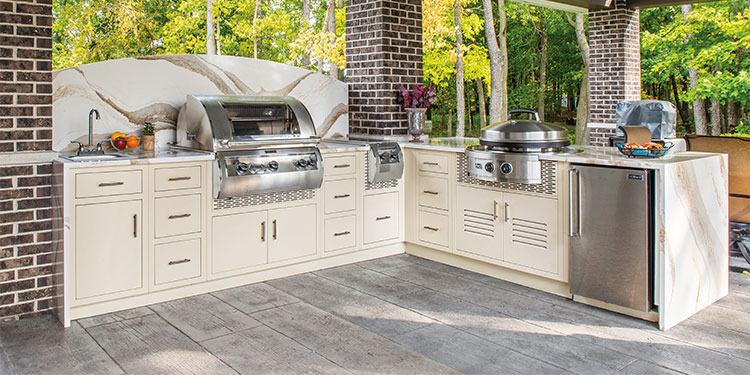 Rock Run Cabinetry Aluminum Outdoor Kitchen Cabinets with Appliances shown in Sandstone