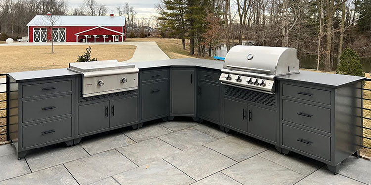 Rock Run Cabinetry Aluminum Outdoor Kitchen Cabinets with Grill shown in Sam Grey Hammer