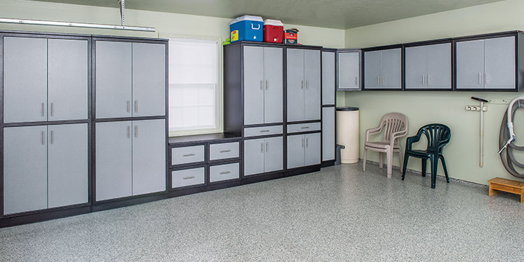 Rock Run Cabinetry Garage Cabinets shown in Silvervein and Blue Speckle