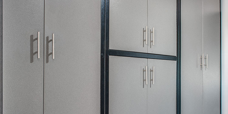 Rock Run Cabinetry Mudroom Cabinets shown in Glossy Black and Grey Speckle